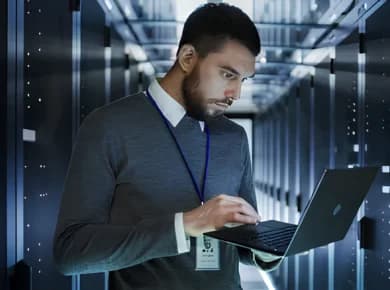 A Netcorp team member reviewing asset movement history